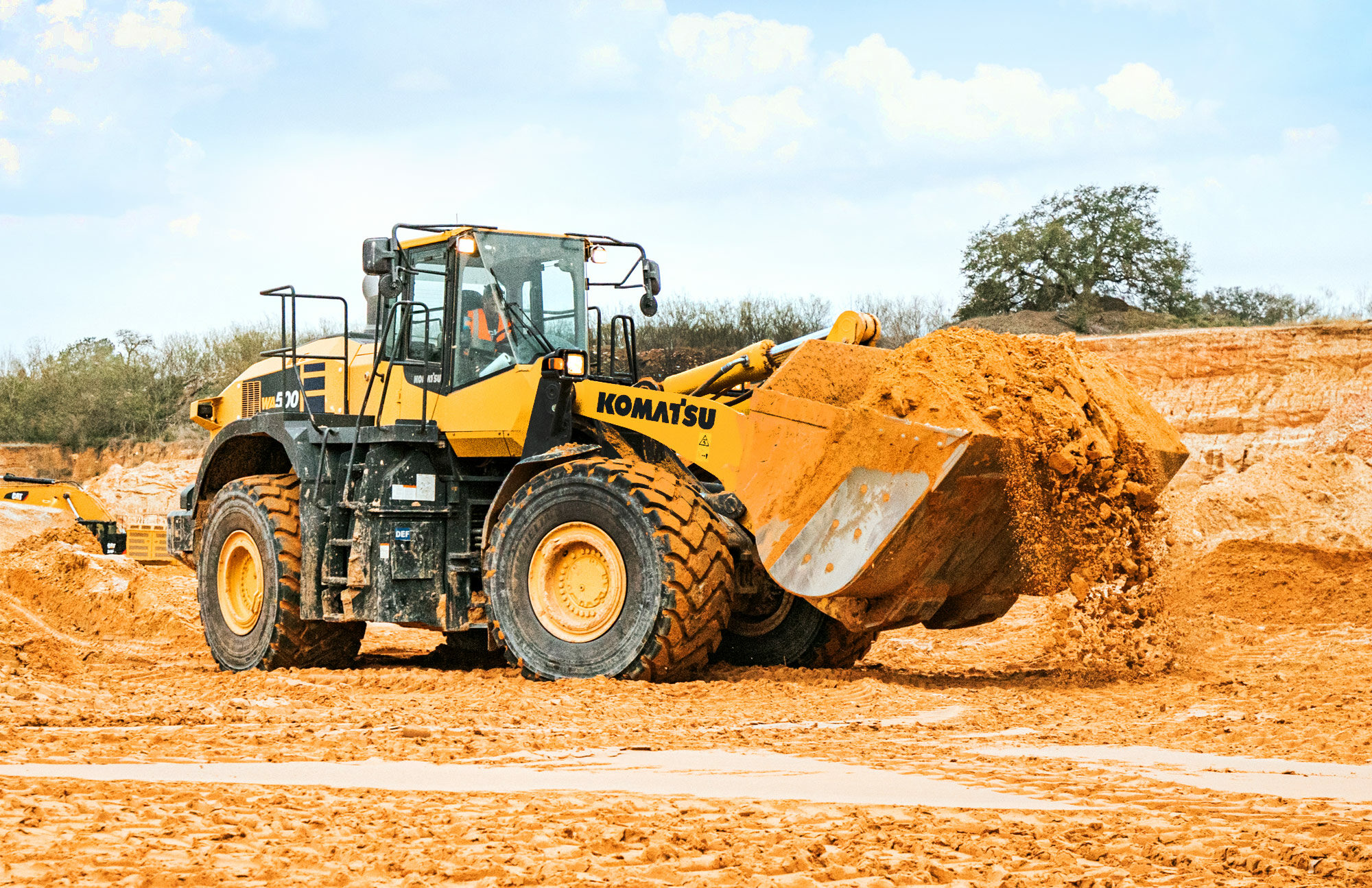 Madden Materials Tractor in Sand Quarry